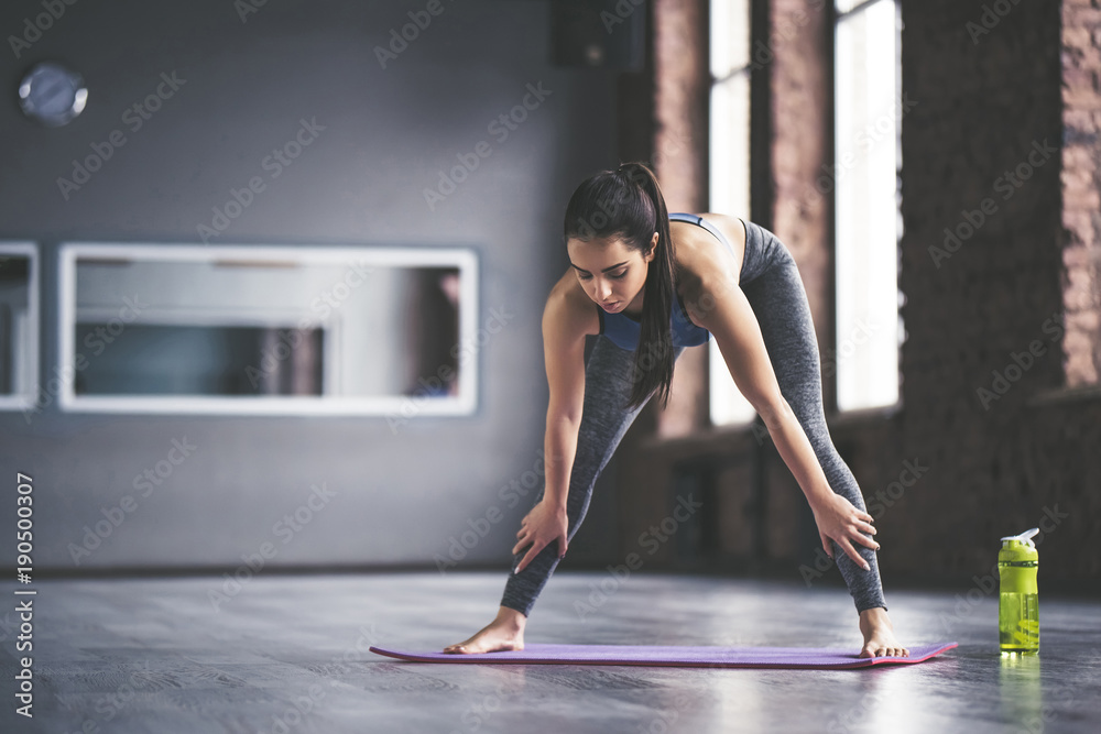 Sport girl doing yoga