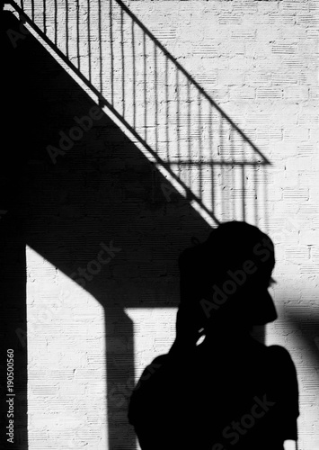 Shadow of woman on the wall