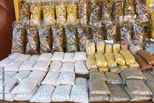 Traditional Greek foods packed in the shelf of the store (beans, lentils, trachanas, barley, chilopites, fides )