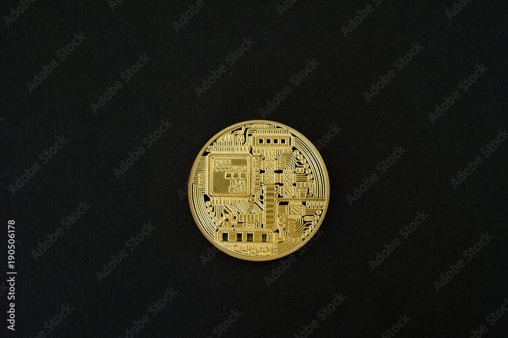 Gold Bitcoins isolated on black background