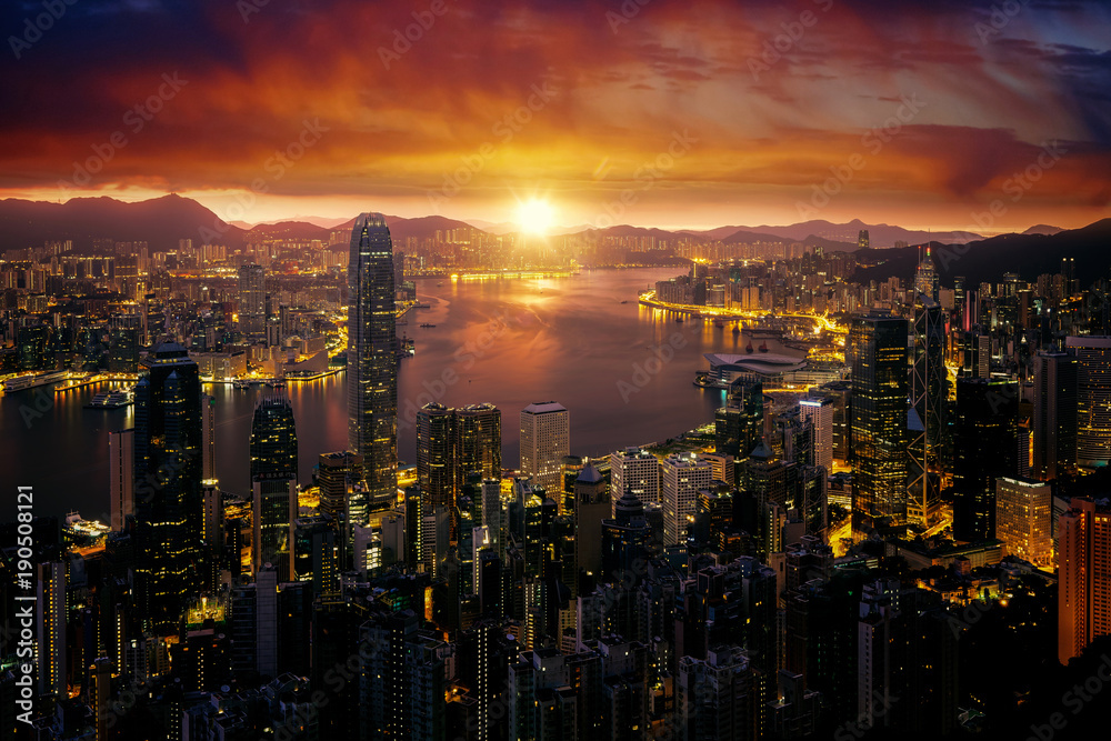 Cityscape of Marning sunrise and Hong kong city fron Victoria peak