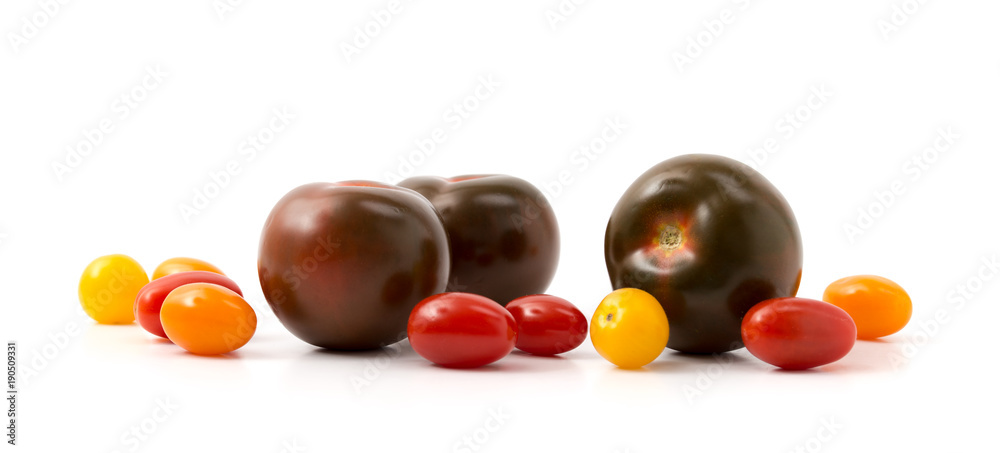 Kumato-Tomaten und Cocktailtomaten Kumato-Tomaten und Cocktailtomaten