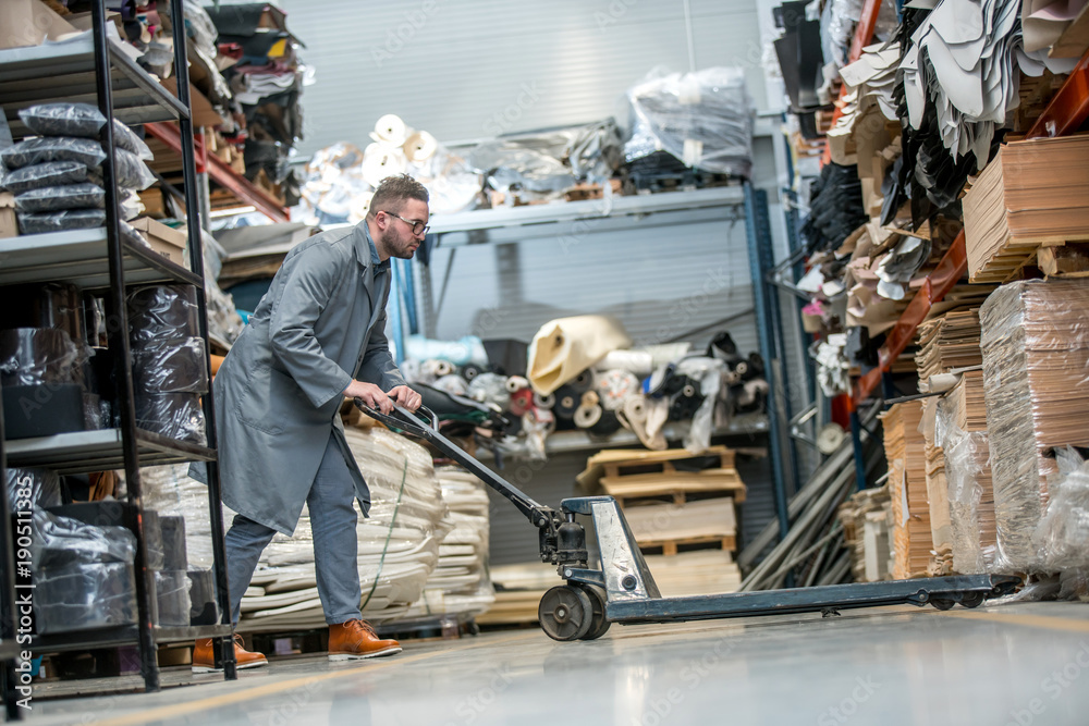 Working at leather warehouse at shoe factory used warehouse equipment Working at leather warehouse at shoe factory used warehouse equipment