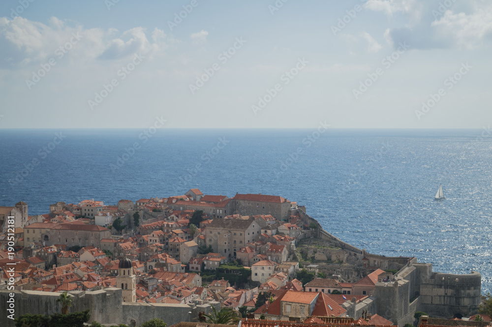 View onto Old Town of Dubrovnik with Sailing Boat from Lookout Point, Croatia
