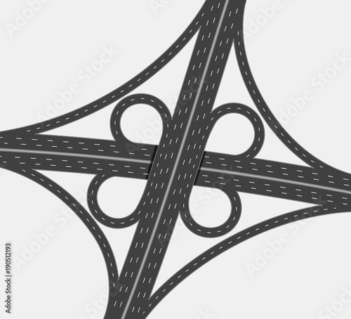 Highway crossroad, two level traffic junction, four way interchange with loop ramps and white road marks. Top view, close up.