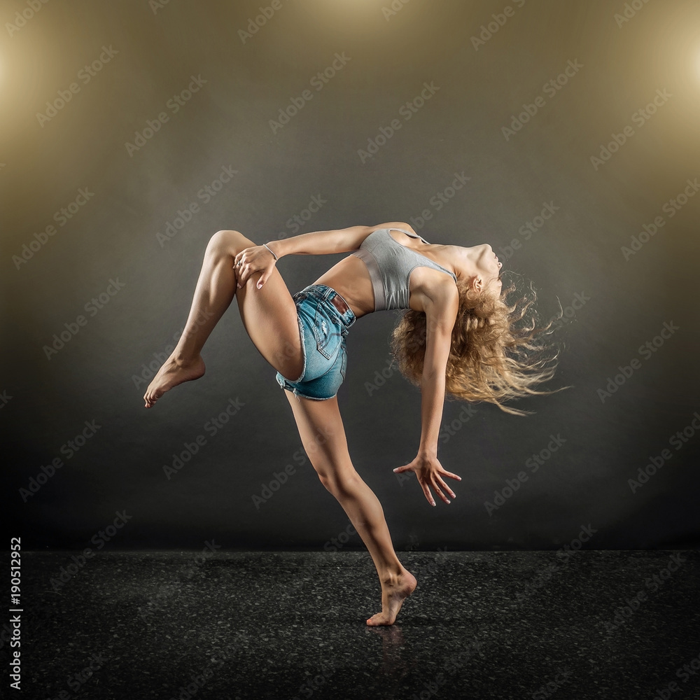 One person, dancer, woman in dynamic beautiful action figure un One person, dancer, woman in dynamic beautiful action figure un