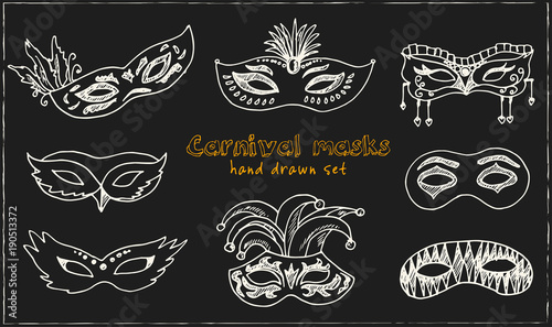 Hand drawn doodle carnival masks set.