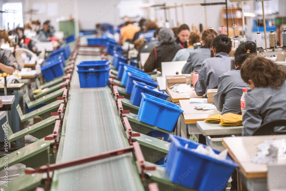 Fototapeta premium machinery and conveyor belts used in shoe manufacturing