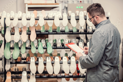 manager at a leather shoe manufacturing factory