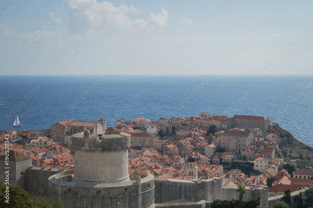 View onto Old Town of Dubrovnik with Sailing Boat from Lookout Point, Croatia