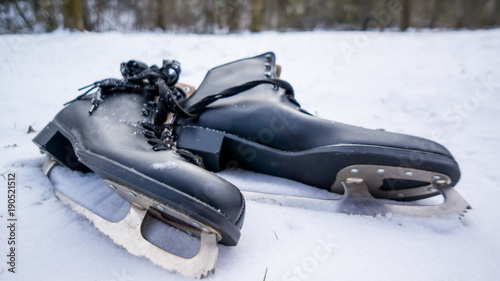 pair of skates in snow