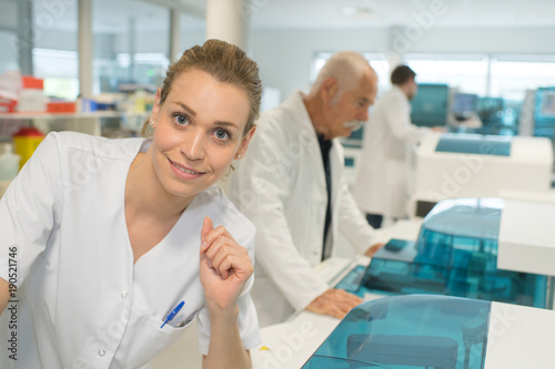 happy female doctor with lab coat