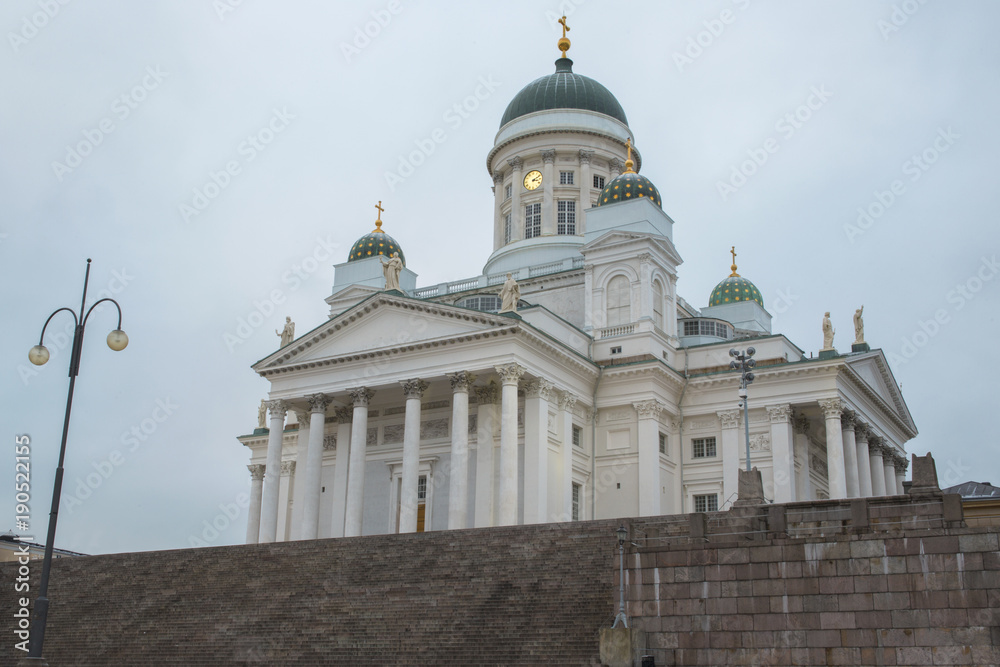 View of the Helsinki Cathedral, Finnish Lutheran Evangelical Church, belonging to the diocese of the capital of Finalndia. The temple is white with blue domes and golden details