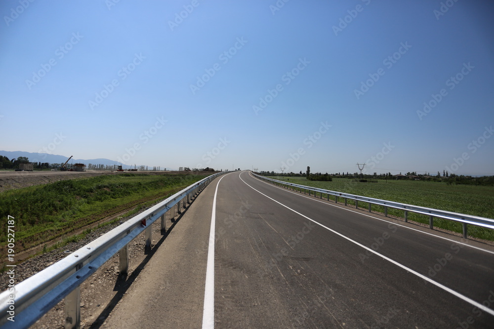 highway under the blue sky