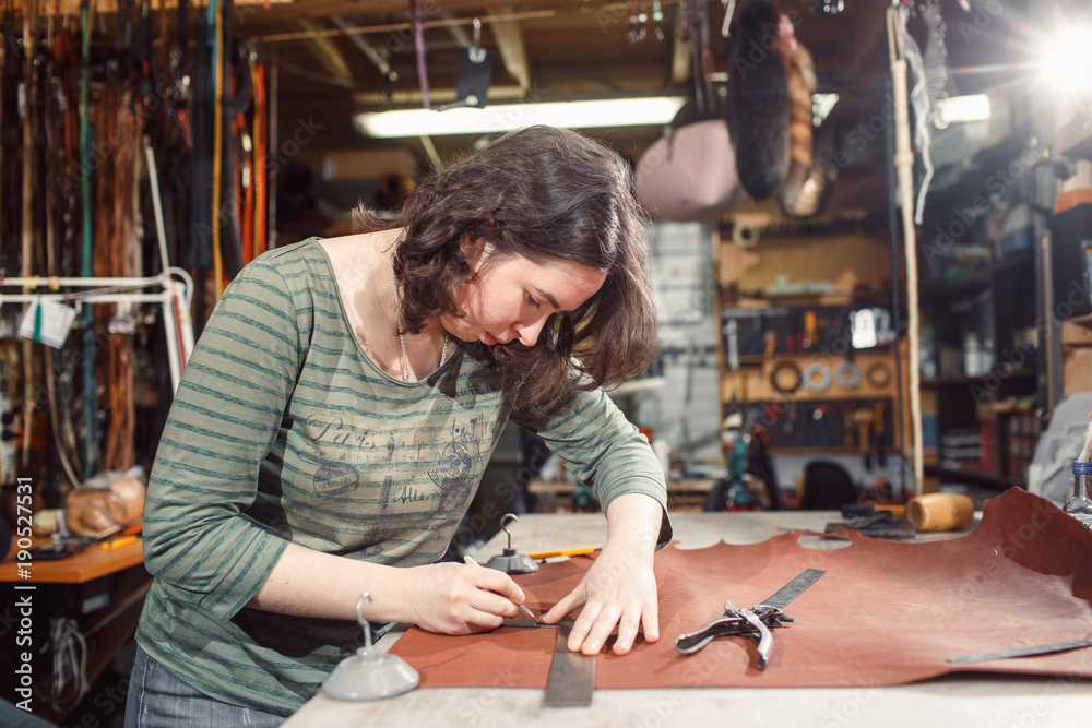 Working process in the leather workshop. Working process in the leather workshop.