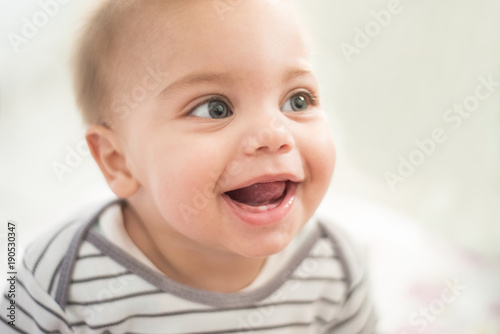 Baby smiling - Baby tooth photo