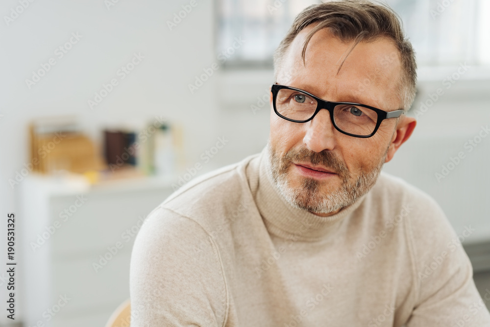 Bearded middle-aged man wearing glasses Bearded middle-aged man wearing glasses
