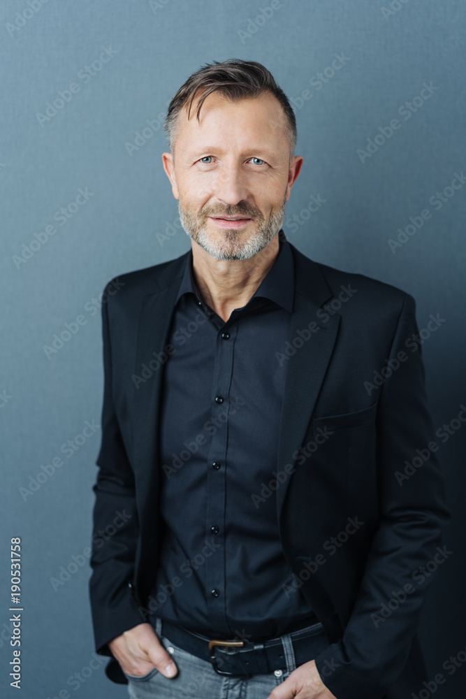 Studio shot portrait of a handsome middle-aged man Studio shot portrait of a handsome middle-aged man