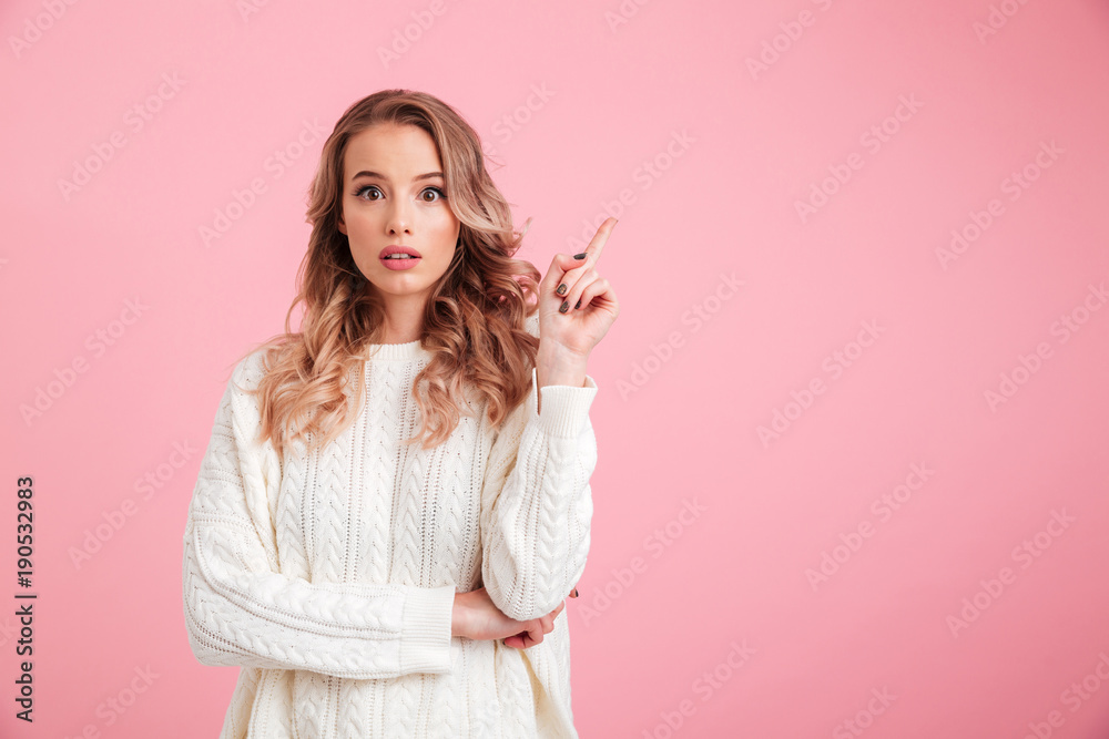 Shocked young woman pointing. Shocked young woman pointing.
