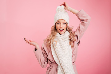 Happy young woman wearing warm scarf