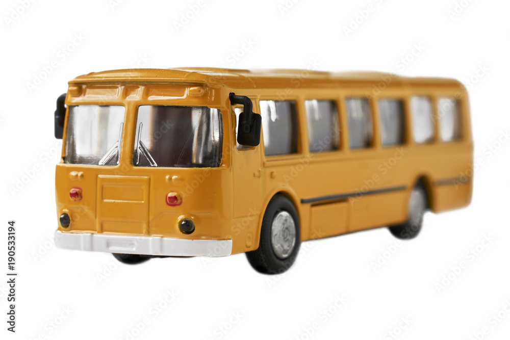 Toy model of old soviet bus isolated on white