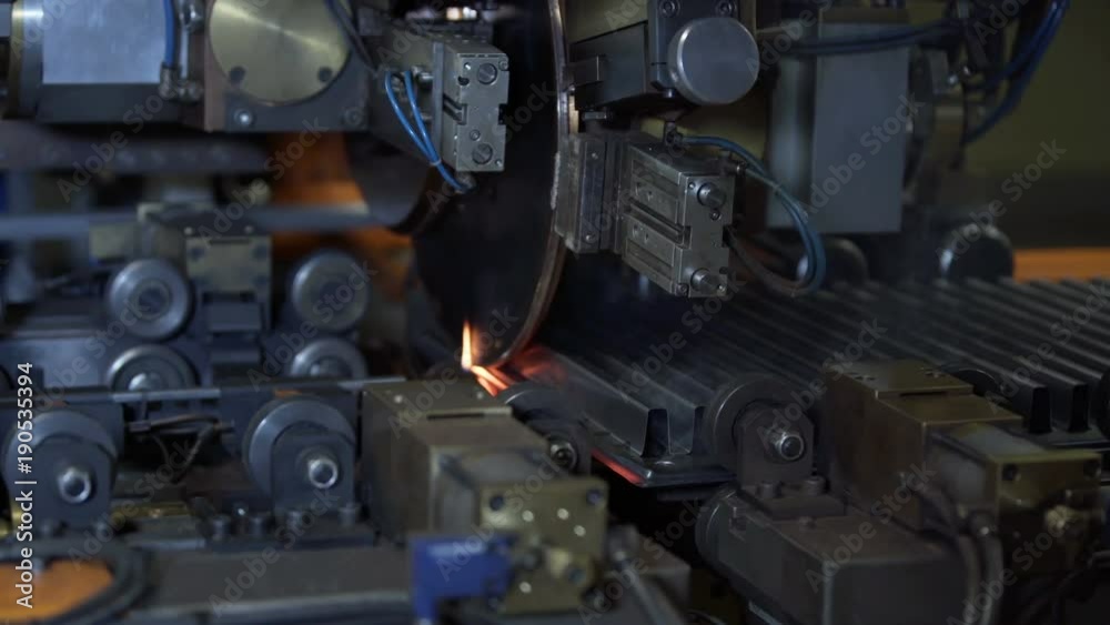 Working Conveyor Belt on the heating radiator Plant with Spot Welding Robots Working Conveyor Belt on the heating radiator Plant with Spot Welding Robots