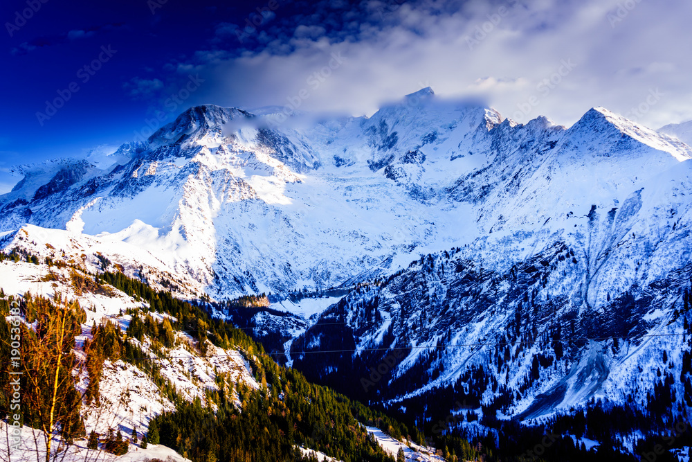 Fototapeta premium Beautiful landscape of snowy mountain view in Bellvue Saint-Gervais-les-Bains. One of Alps mountain top near Mont Blanc. Famoust place for winter sport like skiing with family and for recreation.