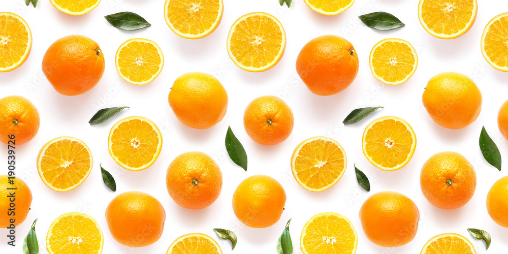 Seamless pattern of fresh oranges isolated on white background, top view, flat lay. Food texture background. Healthy food, detox, diet. Seamless pattern of fresh oranges isolated on white background, top view, flat lay. Food texture background. Healthy food, detox, diet.