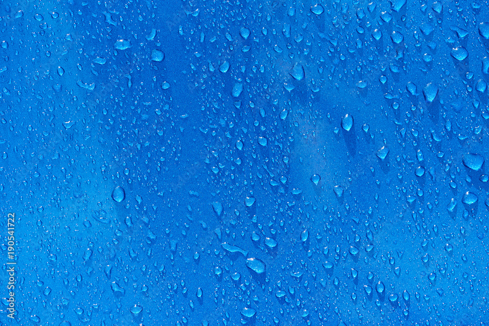 Rain drops on blue metal background Rain drops on blue metal background