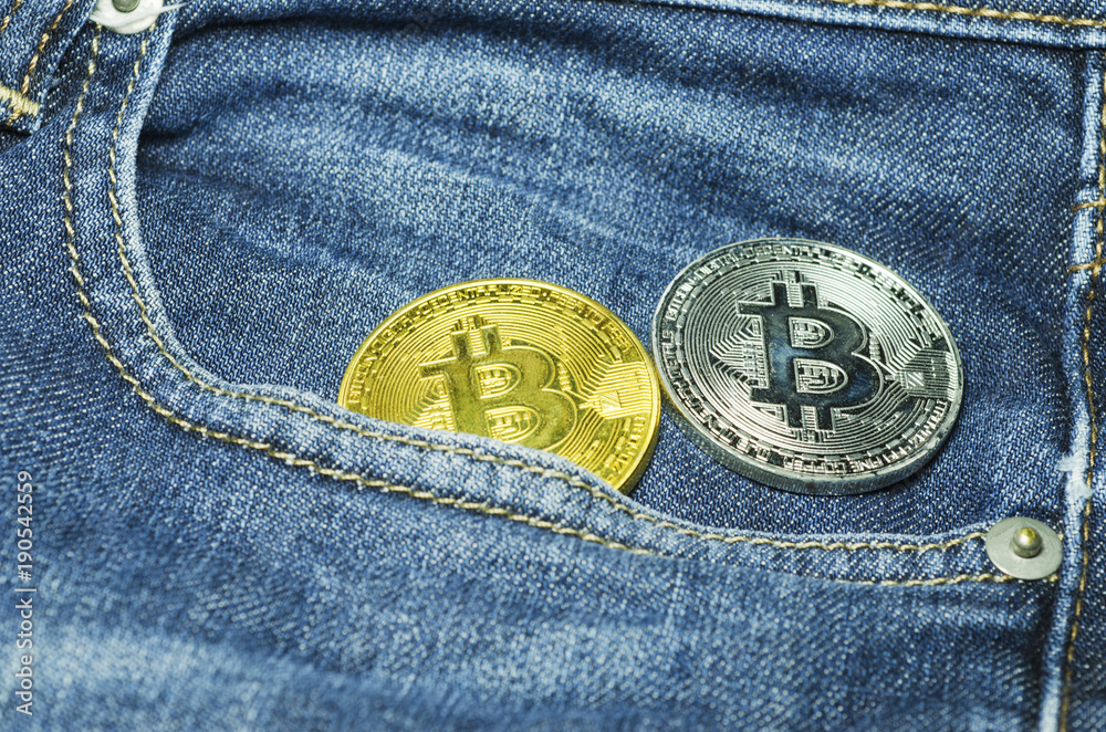 Bit coin in the pocket of jeans Bit coin in the pocket of jeans