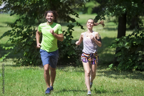 Young couple jogging at the...