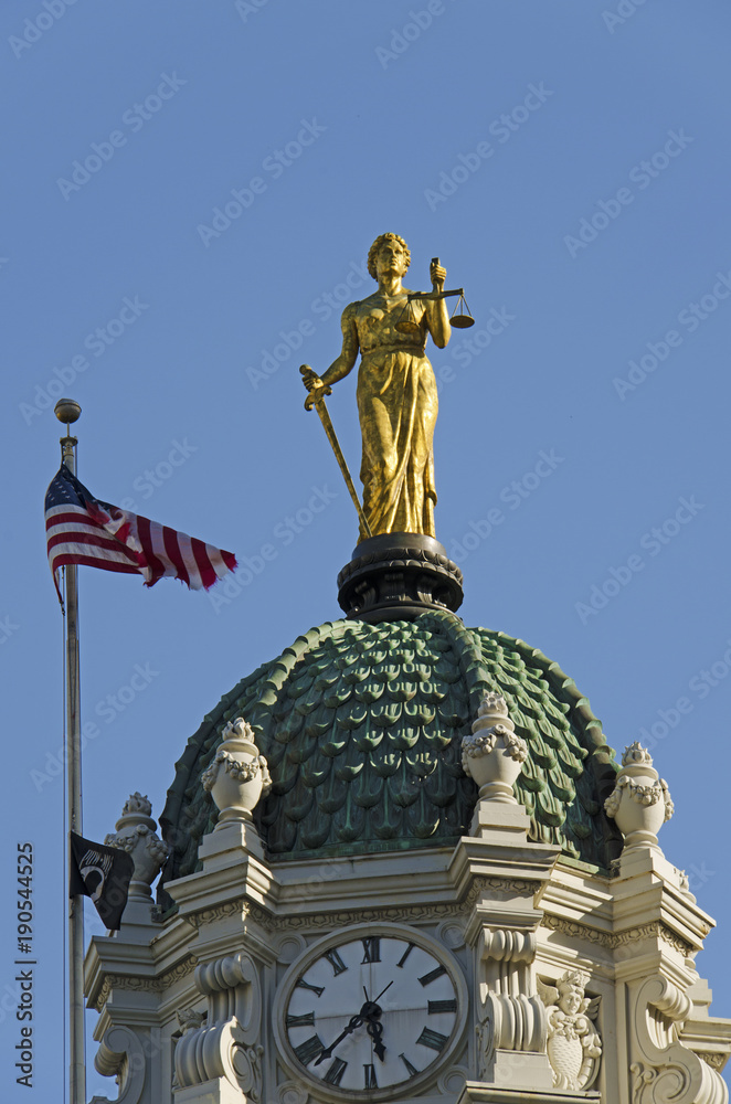 Lady Justice statue made of bronze on top of the Brooklyn Borough Hall