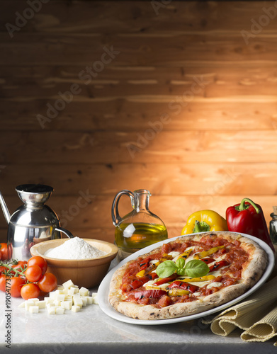 Pizza with peppers on the table