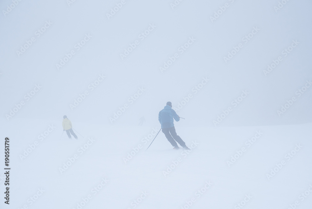 Skier silhouette in white winter nature Skier silhouette in white winter nature