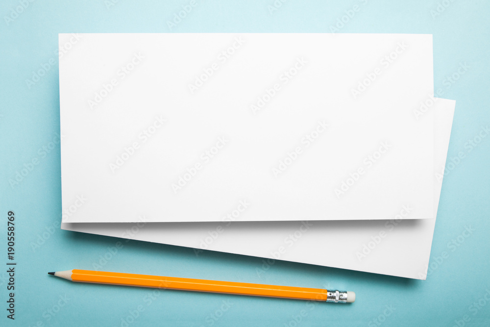 White DL Flyer Mock-Up on blue background. White DL Flyer Mock-Up on blue background.