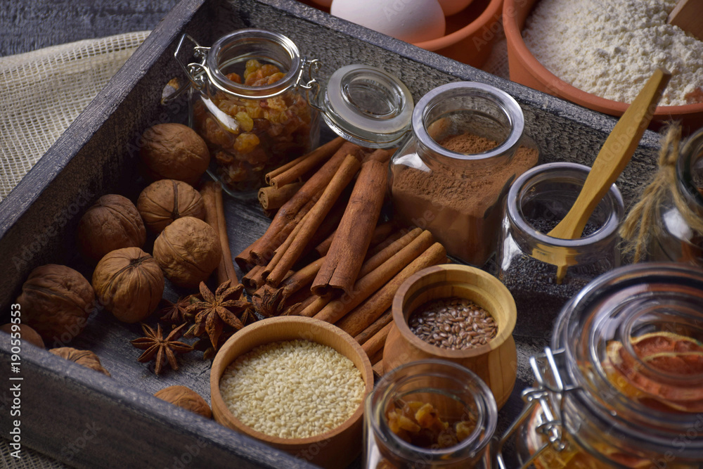 box of spices for baking and cooking. Home kitchen. Homemade baking. Close-up. box of spices for baking and cooking. Home kitchen. Homemade baking. Close-up.