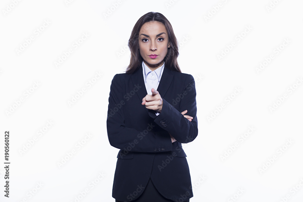 Young smiling confident business woman looking directly into the camera with arms crossed isolated on white background. Concept of office work. Young smiling confident business woman looking directly into the camera with arms crossed isolated on white background. Concept of office work.