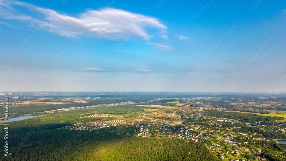 Aerial top view of residential area summer houses in forest from above, countryside real estate and small dacha village in Ukraine
