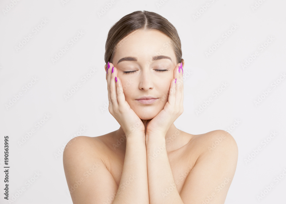 Portrait of a charming brunette with eyes closed