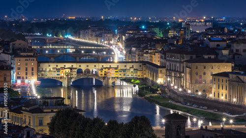 Famous Ponte Vecchio bridge at night in Florence, Tuscany