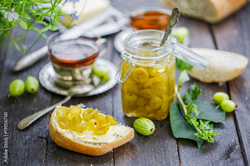 Bread with butter and gooseberry jam