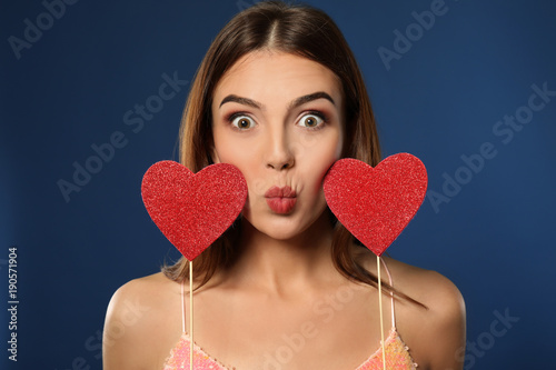 Emotional young woman with ...