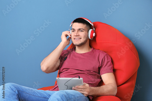Man listening to audiobook ...