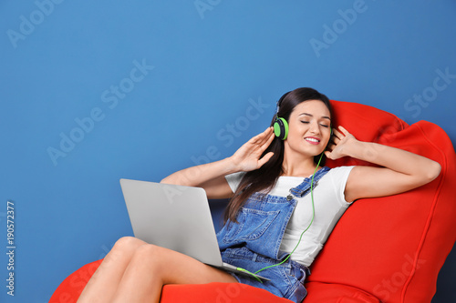 Woman listening to audioboo...