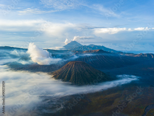 Aerial view from drone to Mount Bromo volcano (Gunung Bromo) and Batok at morning in Bromo Tengger Semeru National Park, East Java, Indonesia.