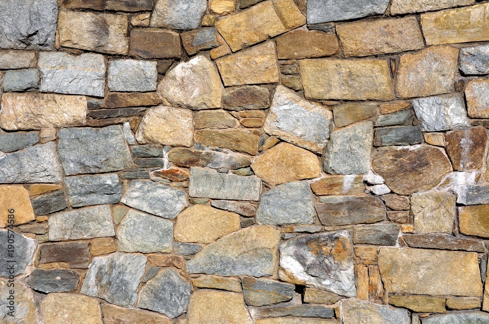 Obraz premium A background - a stone wall. Texture back ground.