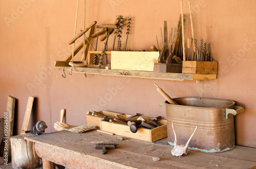 Wood workbench with old wood working tools