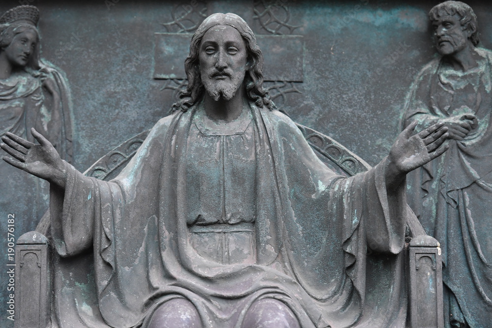 Obraz premium Weathered relief of Jesus Christ on a tombstone
