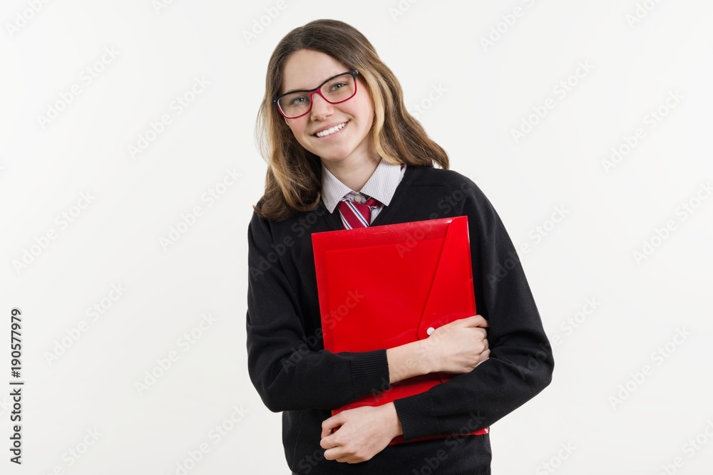 Girl teenager, high school student. Poses on a white background Girl teenager, high school student. Poses on a white background
