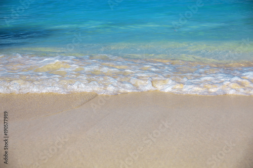 sea surf  blue clear water and white sand